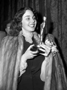 Handout photo shows actress Jones holding her Academy Award for her titular role in "The Song of Bernadette" during the awards ceremony in Hollywood